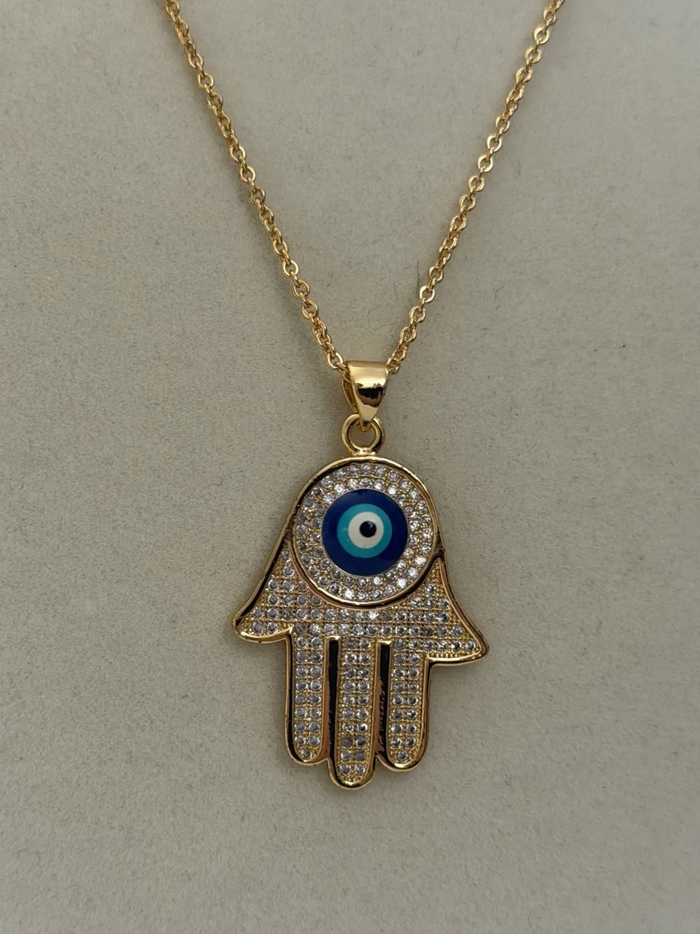 Rose Gold Hamsa Hand Evil Eye Pendant Necklace - Blue Accent